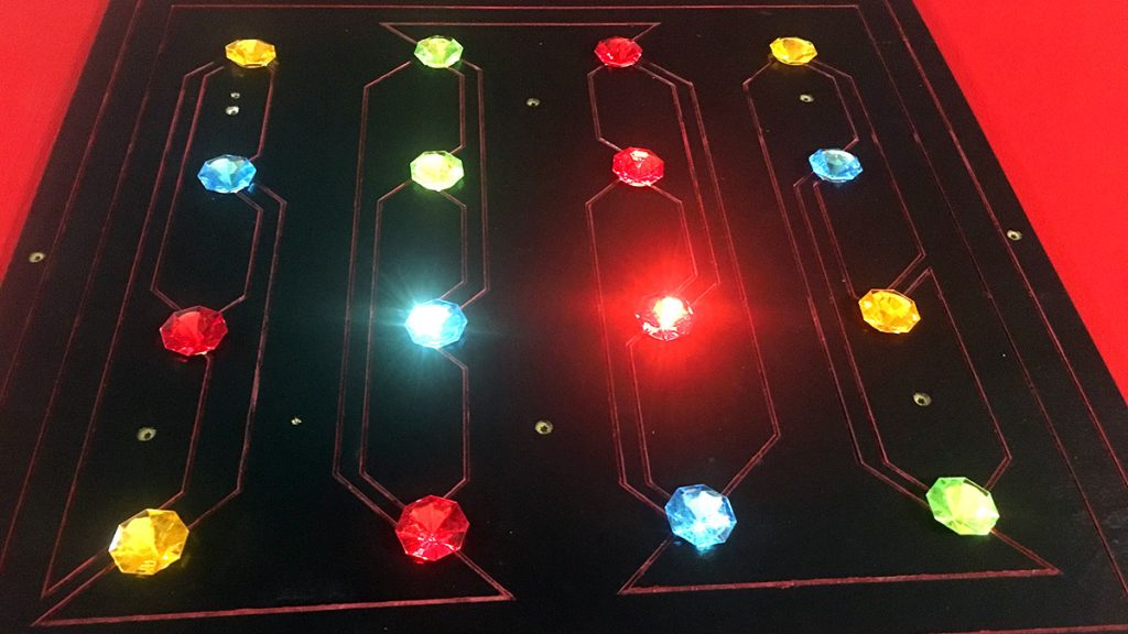 Shining jewels that are part of a puzzle.